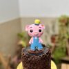 Una mini torta artesanal con un chanchito mameluco, una opción dulce y encantadora para celebrar con estilo.