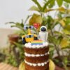 Deléitate con nuestras mini tortas adornadas con dos encantadores personajes en 3D, ¡la combinación perfecta para tu celebración!